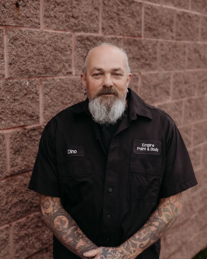 Dino Petrella, shop manager, in his Empire work shirt