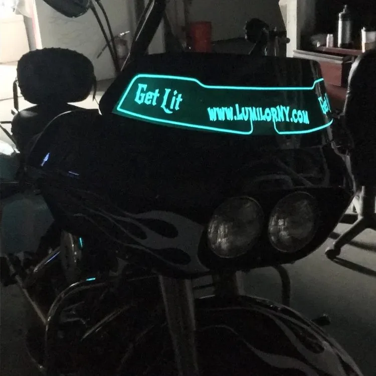A motorcycle fairing with Lumilor light-emitting lettering