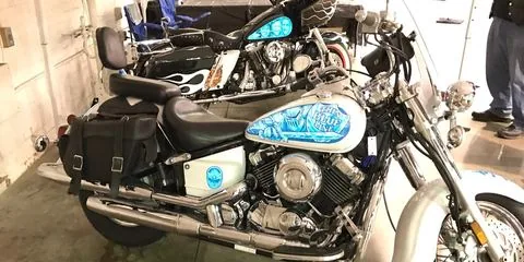 A Yamaha with a Lumilor tank, photographed in the shop