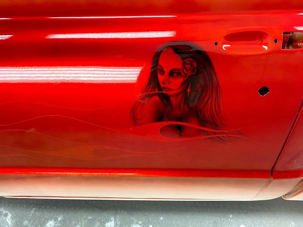 An airbrushed portrait laid into a bright red panel